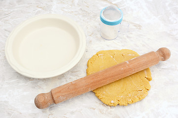 Image showing Rolling out shortcrust pastry for a pie