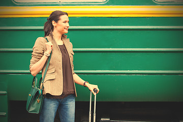 Image showing beautiful adult woman with travel bag