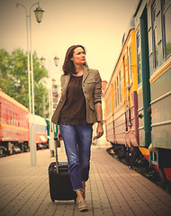 Image showing beautiful adult woman with suitcase