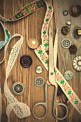 Image showing Old scissors, old lace and vintage buttons