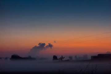 Image showing early sunrise over foggy farm landscape in rock hill south carol