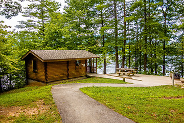 Image showing Log cabin surrounded by the forest at lake santeetlah north caro
