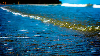 Image showing water foam waves ocean sunny day light