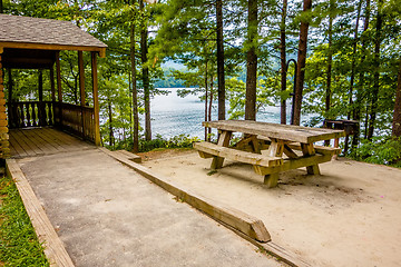 Image showing Log cabin surrounded by the forest at lake santeetlah north caro