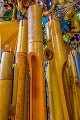 Image showing wooden and other wind chimes on display