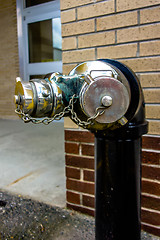 Image showing standpipe with siamese connection device for fire hoses