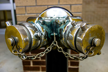 Image showing standpipe with siamese connection device for fire hoses