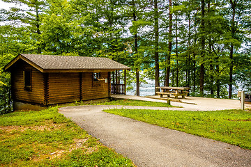 Image showing Log cabin surrounded by the forest at lake santeetlah north caro