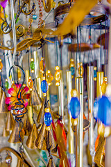 Image showing wooden and other wind chimes on display