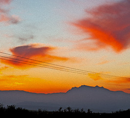 Image showing mountain in morocco africa   current cables     and red sunrise