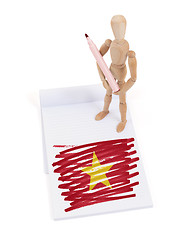 Image showing Wooden mannequin made a drawing - Vietnam