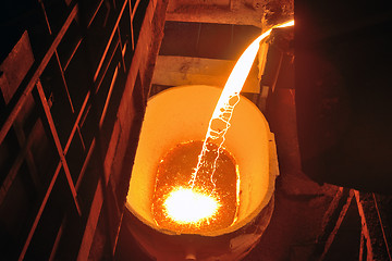 Image showing molten metal poured from ladle 