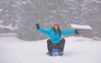 Image showing Teen girl on sledge 