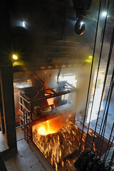 Image showing molten metal poured from ladle