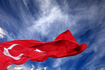 Image showing Waving flag of Turkey against blue sky