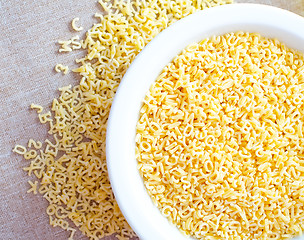 Image showing Pasta - alphabet, raw italian pasta in bowl