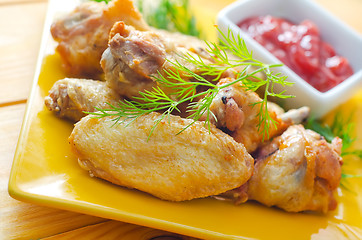 Image showing Hot Meat Dishes - Grilled Chicken Wings with Red Spicy Sauce