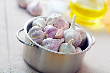Image showing garlic in metal bowl on the table