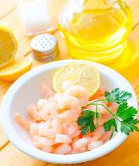 Image showing boiled shrimps in the white bowl on the table