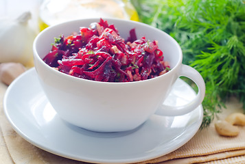 Image showing Fresh salad with beet and walnuts, vegetarian salad