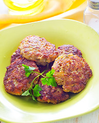 Image showing cutlets on the green plate