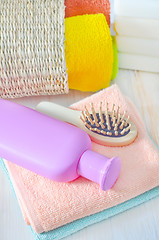 Image showing color towels and shampoo