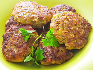 Image showing cutlets on the green plate