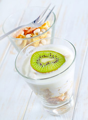 Image showing fresh yogurt and muesli in a glass