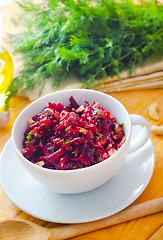 Image showing Fresh salad with beet and walnuts, vegetarian salad