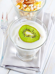 Image showing fresh yogurt and muesli in a glass