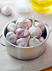 Image showing garlic in metal bowl on the table