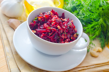 Image showing Fresh salad with beet and walnuts, vegetarian salad