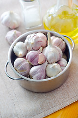 Image showing garlic in metal bowl on the table