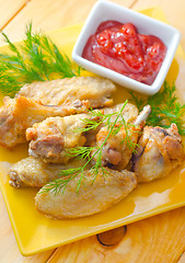 Image showing Hot Meat Dishes - Grilled Chicken Wings with Red Spicy Sauce