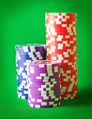 Image showing Group from chips for poker on the green background