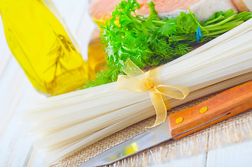 Image showing raw rice noodles and raw salmon