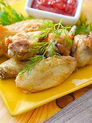 Image showing Hot Meat Dishes - Grilled Chicken Wings with Red Spicy Sauce