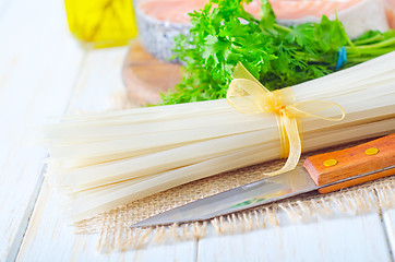 Image showing raw rice noodles and raw salmon