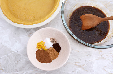 Image showing First steps of making pumpkin pie 