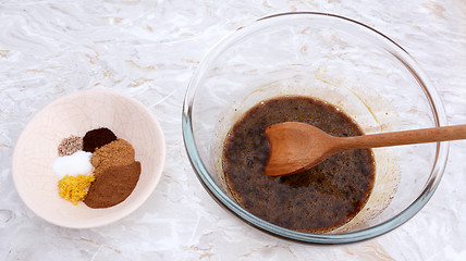 Image showing Ingredients for pumpkin pie - spices with egg and sugar filling