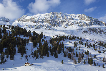 Image showing Small house in a wintry mountain landscape
