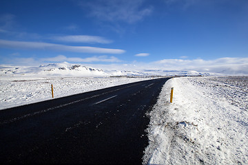 Image showing Wet road with impressive landscape 