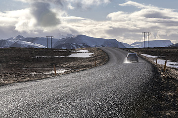 Image showing Snowy volcano landscape with dramatic clouds in Iceland