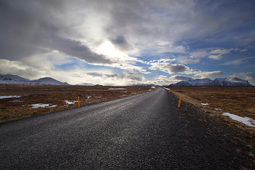 Image showing Snowy volcano landscape with dramatic clouds in Iceland