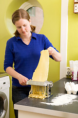 Image showing Female making Fettuccine