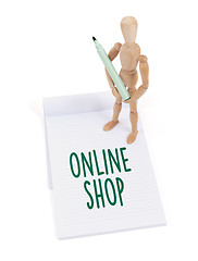 Image showing Wooden mannequin writing - Online shop