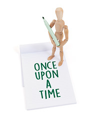 Image showing Wooden mannequin writing - Once upon a time