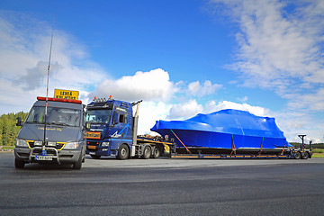 Image showing Pilot car and Exceptional Load at Truck Stop