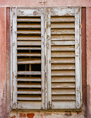 Image showing window with  closed wooden shutters