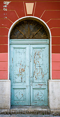 Image showing old blue ragged shabby wooden door